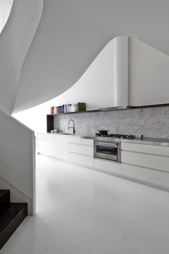 Minimalist White Loft Design With Sculptural Accents