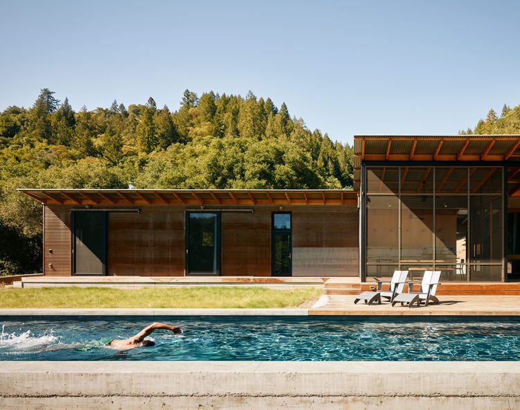 Uncluttered Poolside Home Opened To Outdoors