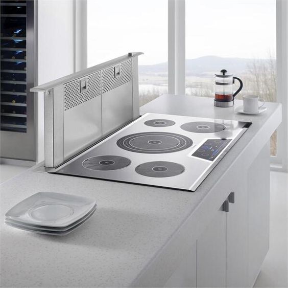 https://www.digsdigs.com/photos/02-concrete-kitchen-island-with-a-minimal-cook-top.jpg