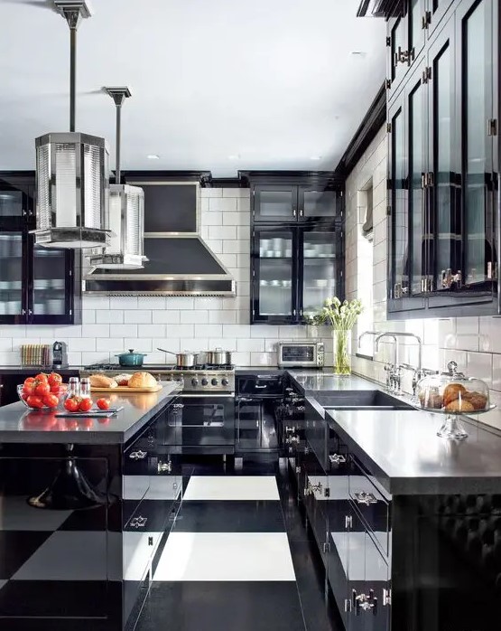 Another great example of a black and white kitchen with silver