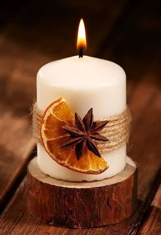 https://www.digsdigs.com/photos/2011/11/a-candle-with-twine-a-dried-fruit-slice-and-a-spice-piece-is-a-gorgeous-idea-for-fall-or-winter-and-it-provides-cool-aroma.jpg