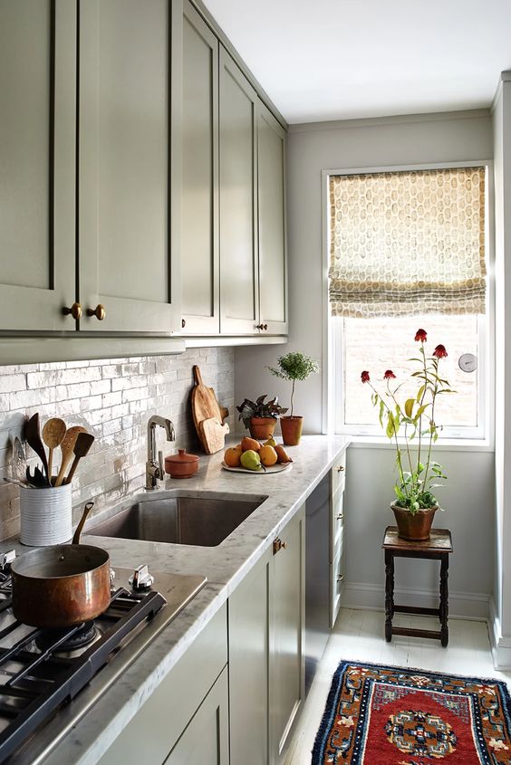 https://www.digsdigs.com/photos/2012/02/a-green-one-wall-kitchen-with-stone-countertops-and-a-tile-backsplash-and-some-printed-textiles-is-chic.jpg