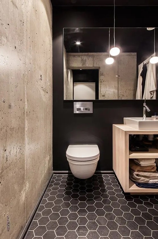 https://www.digsdigs.com/photos/2012/08/a-black-wall-black-hex-tiles-and-a-contrasting-concrete-wall-for-a-modern-bathroom-with-an-industrial-feel.jpg