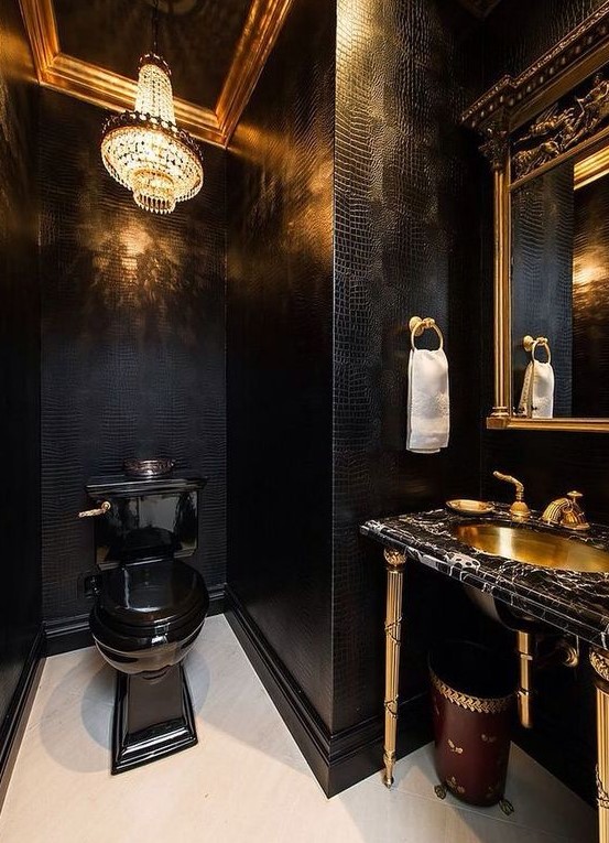 https://www.digsdigs.com/photos/2012/08/a-luxurious-powder-room-with-black-leather-walls-a-crystal-chandelier-a-black-toilet-a-black-marble-vanity-and-a-gold-sink.jpg