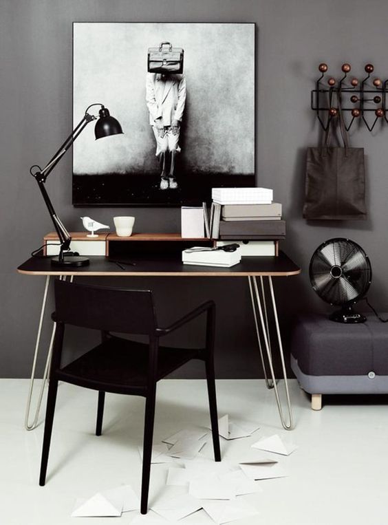https://www.digsdigs.com/photos/2013/03/a-catchy-home-office-with-cocnrete-walls-a-black-deks-with-hairpinlegs-a-black-chair-and-catchy-decor.jpg