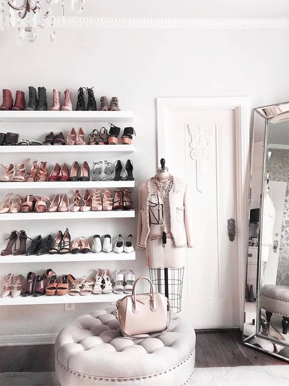 https://www.digsdigs.com/photos/2013/04/a-lovely-and-glam-feminine-closet-with-open-shelves-a-grey-storage-pouf-a-large-mirror-and-touches-of-blush-pink.jpg