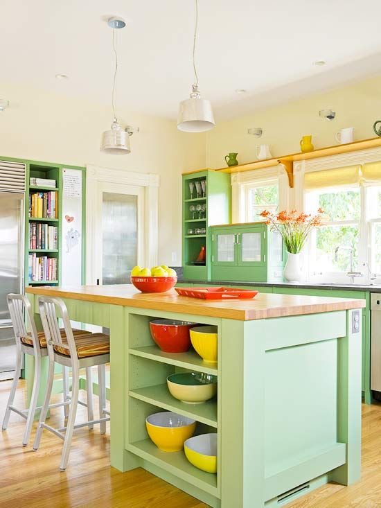 A Chic Farmhouse Mint Kitchen With Light Yellow Walls Mint Green Cabinets Wood And Stone Countertops And Yellow Touches 