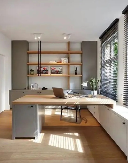 a contemporary home office with a closed storage unit, a floating