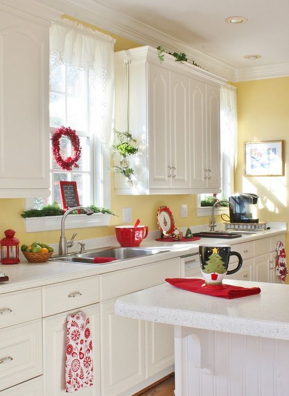 red cups, napkins, a berry wreath and evergreens for a light Christmas feel in the space