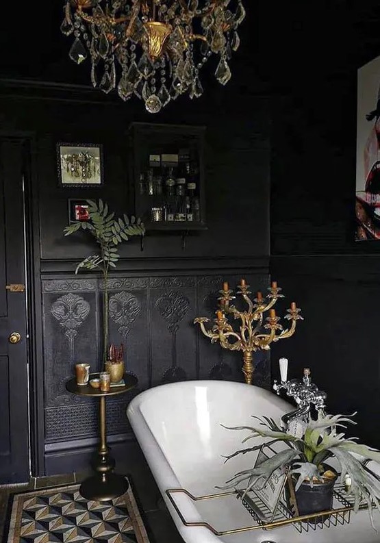 https://www.digsdigs.com/photos/2014/06/a-beautiful-black-Gothic-bathroom-with-black-walls-and-black-wallpaper-a-black-cabinet-a-vintage-bathtub-a-crystal-chandelier-and-candles.jpg