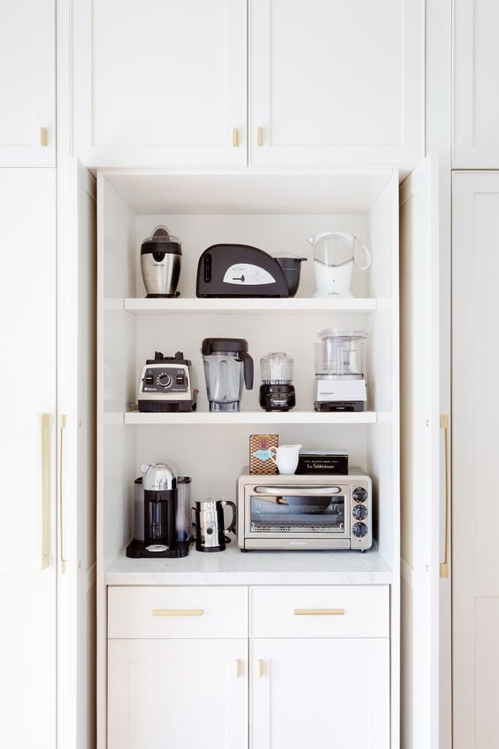 https://www.digsdigs.com/photos/2015/05/a-cabinet-with-shelves-holding-various-appliances-is-a-cool-and-stylish-idea-to-store-them-without-cluttering-the-space.jpg
