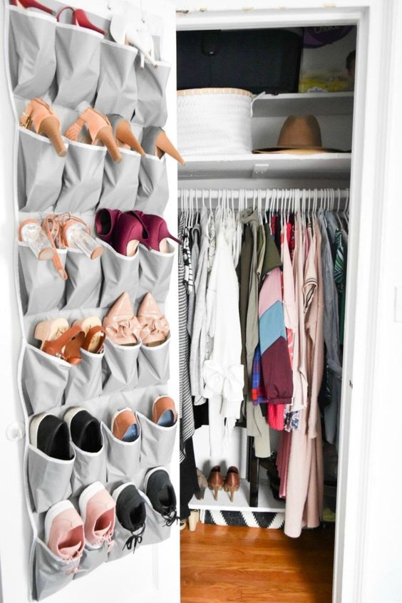 https://www.digsdigs.com/photos/2015/09/a-fabric-organizer-on-the-closet-door-is-great-to-store-shoes-or-accessories-its-modern-simple-and-saves-floor-and-shelf-space.jpg