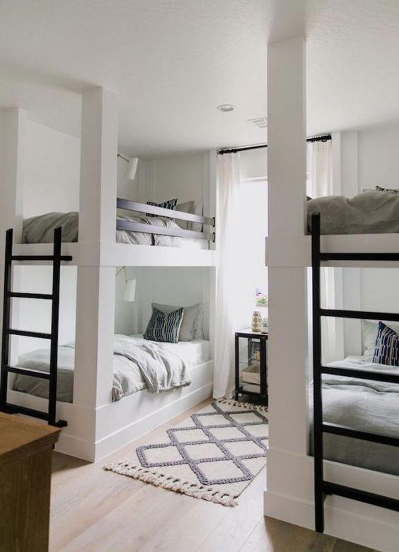 2 bunk beds in a room