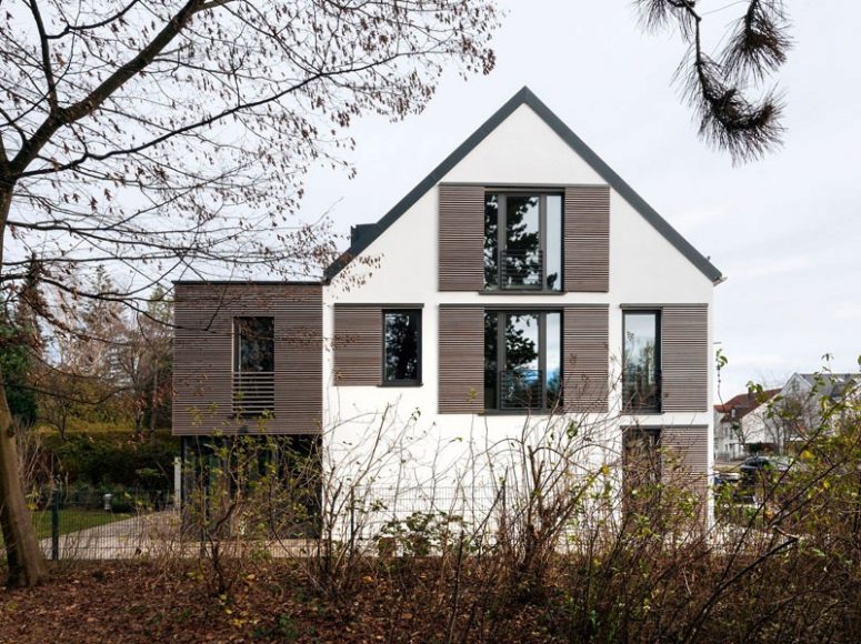 modern stained wood sliding shutters like these ones will keep your home private and will hint on the history of the house