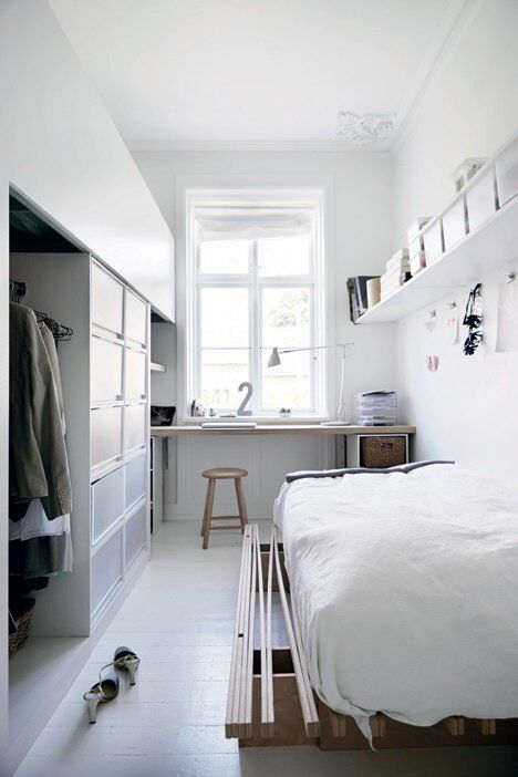 https://www.digsdigs.com/photos/2016/07/an-airy-Scandinavian-bedroom-with-a-windowsill-desk-and-a-stool-a-wardrobe-a-low-bed-and-a-shelf-with-cubbies.jpg