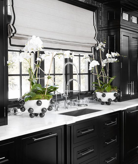 https://www.digsdigs.com/photos/2016/09/28-orchids-in-moss-add-a-luxurious-touch-to-this-traditional-kitchen.jpg