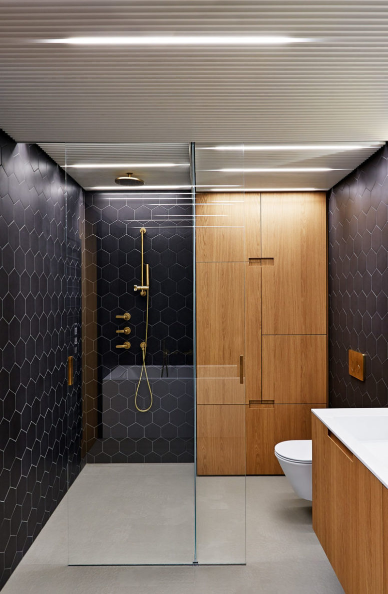 Elegant Black And Brass Bathroom Design With Wooden Touches - DigsDigs