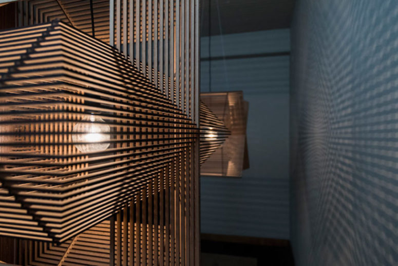 Pendant Lamp Made Up Of Laser Cut Rectangles - DigsDigs