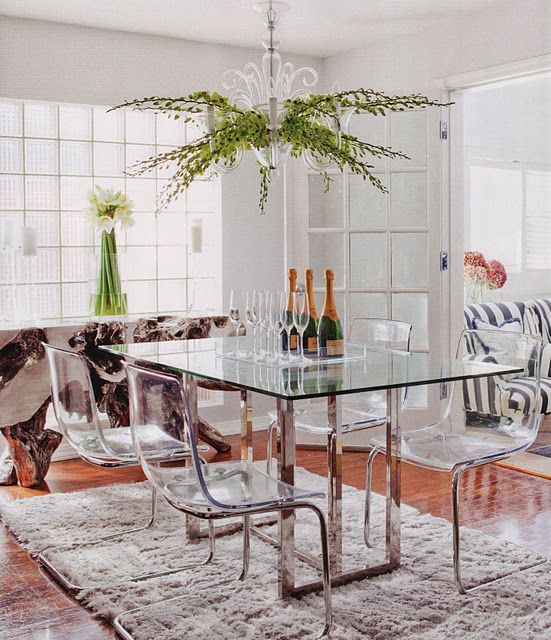 https://www.digsdigs.com/photos/2017/07/24-a-dining-table-with-metal-legs-and-acrylic-chairs-on-the-same-legs-look-modern-chic-and-ethereal.jpg