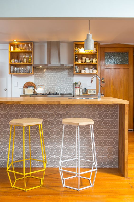 https://www.digsdigs.com/photos/2017/08/04-a-stylish-bar-counter-clad-with-geo-tiles-that-echo-with-the-backsplash-and-wood-with-geometric-stools.jpg