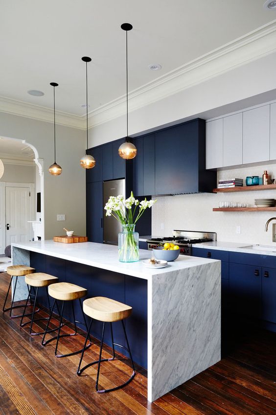 https://www.digsdigs.com/photos/2017/08/18-a-dark-blue-modern-sleek-kitchen-with-white-marble-and-white-cabinets.jpg