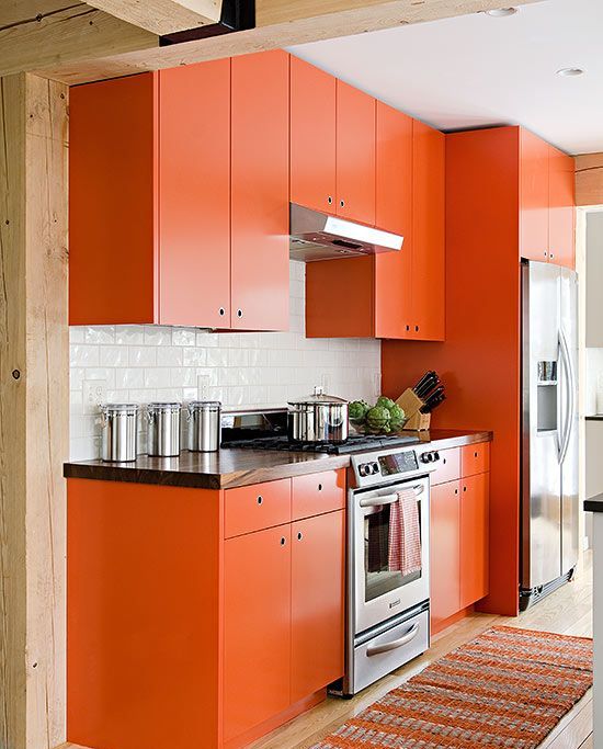 02 A Bold Orange Kitchen With A Simple Modern Design Looks Cheerful And Fun 