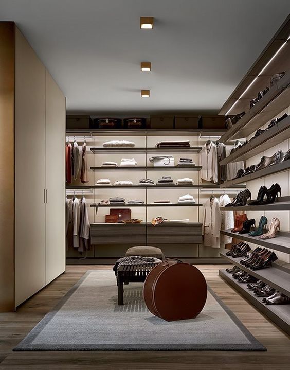 https://www.digsdigs.com/photos/2017/11/08-a-luxurious-modern-closet-with-open-shelving-and-a-large-wardrobe-is-great-for-both-men-and-women.jpg