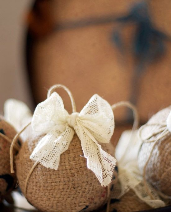 a burlap ornament with a lace bow is a cute vintage-inspired and rustic decoration