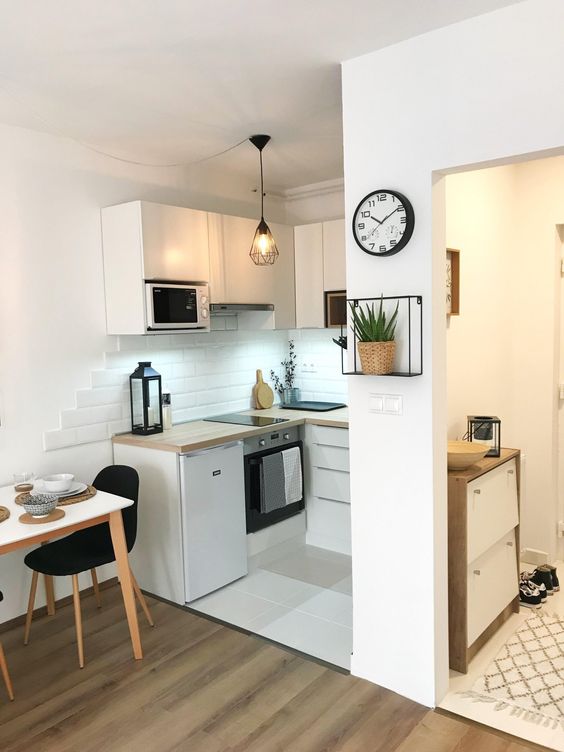 https://www.digsdigs.com/photos/2018/04/02-a-very-small-studio-apartment-done-in-white-and-touches-of-light-colored-natural-wood.jpg