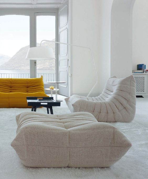 https://www.digsdigs.com/photos/2018/06/22-a-creative-modern-off-white-loveseat-and-a-matching-mustard-one-for-a-bold-contemporary-space.jpg