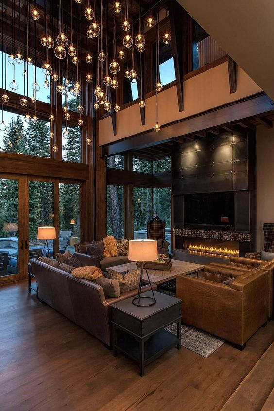 02 A Modern Rustic Luxurious Home With A Double Height Ceiling And A Whole Hanging Light Installation 