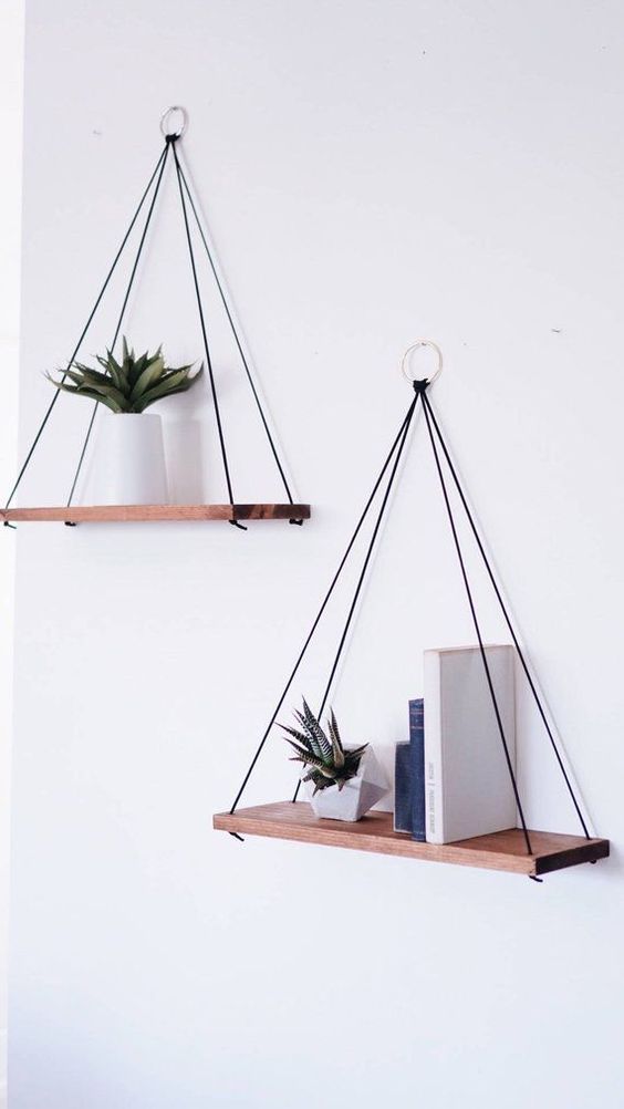 https://www.digsdigs.com/photos/2019/06/02-simple-and-elegant-hanging-shelves-with-several-threads-attached-to-the-rings-on-the-wall-for-a-boho-feel.jpg