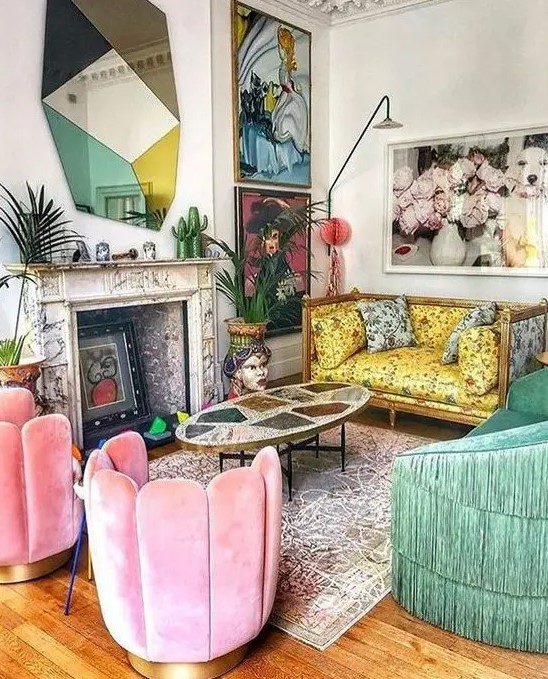 a maximalist living room with a yellow printed sofa, pink chairs and a green fringe sofa, bold artworks and a catchy mirror