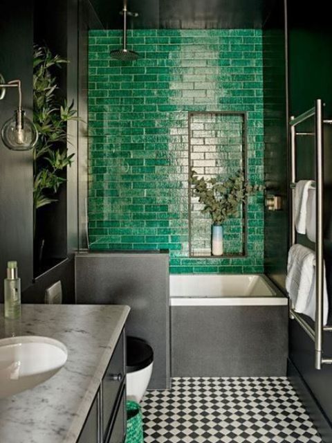 02 A Moody Bathroom With A Statement Emerald Tile Wall A Checked Floor And A Marble Countertop Looks Super Bold 