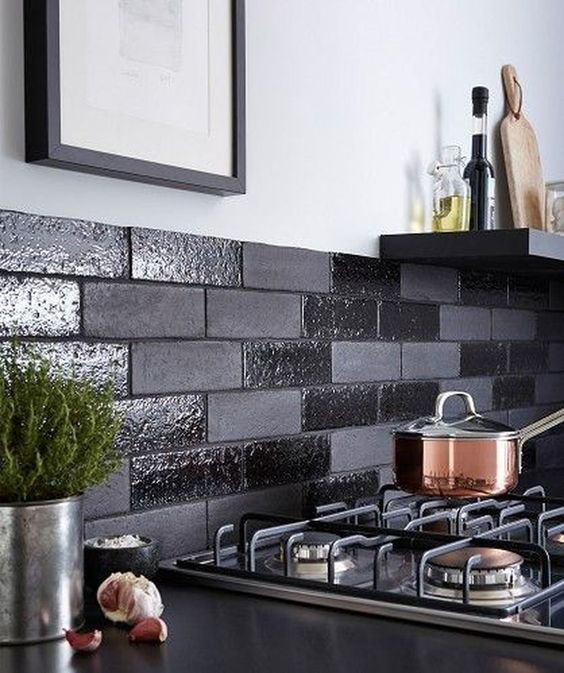 15 A Black Backsplash Done With Shiny And Matte Faux Bricks Is A Cool And Fresh Modern Idea To Try 