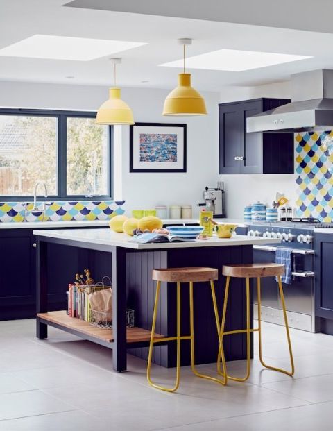 A Bright And Cheerful Kitchen Done In Bold Blue And Sunny Yellow With Catchy Scale Tiles And White Surfaces For A Refresh 