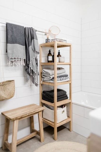 Decorating the Laundry Room  Bathroom towel storage, Baskets on wall,  Bathroom towel storage ideas