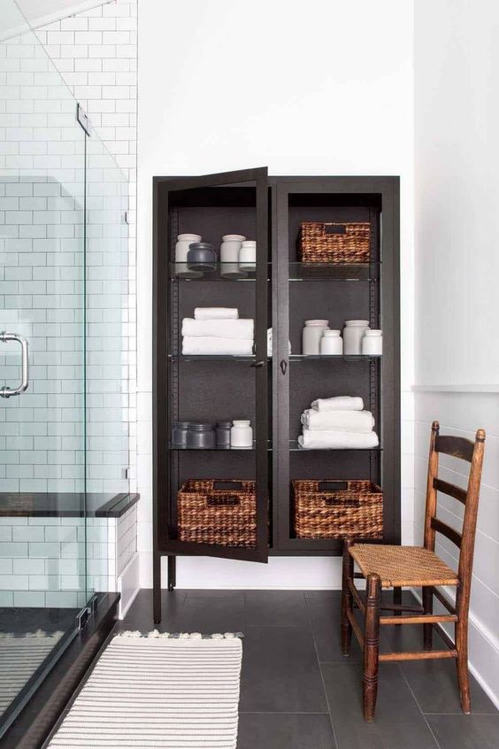 https://www.digsdigs.com/photos/2020/06/04-a-glass-closet-with-towels-is-a-nice-towel-storage-piece-but-it-fits-only-a-large-bathroom.jpg
