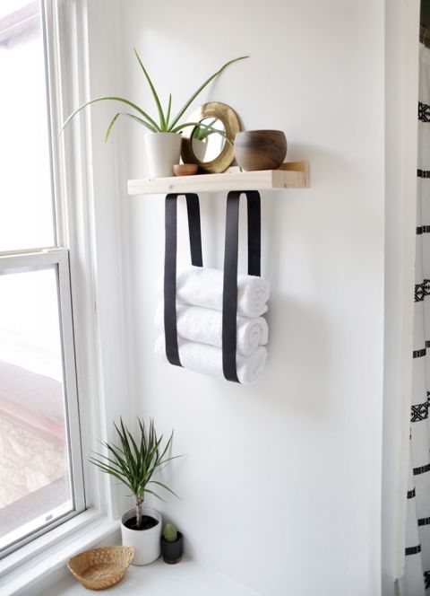 https://www.digsdigs.com/photos/2020/06/13-a-wood-and-leather-strap-towel-shelf-will-let-you-store-not-only-towels-but-also-decor-and-accessories.jpg