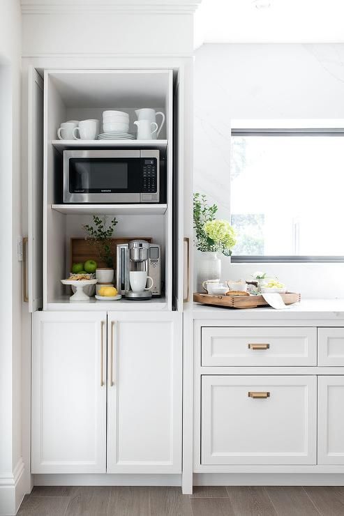 From ovens to coffee machines. Contemporary appliances for a minimalist  kitchen