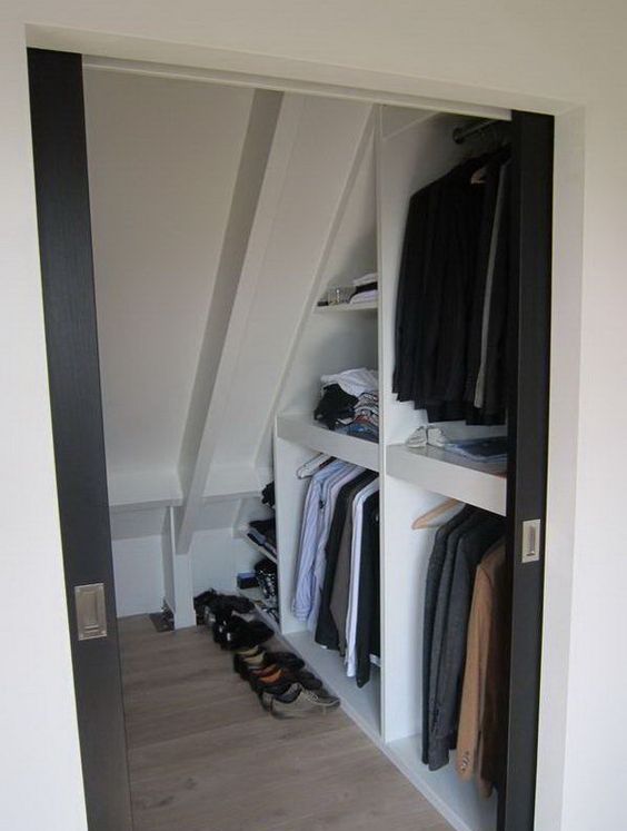 https://www.digsdigs.com/photos/2022/03/a-small-attic-walk-in-closet-with-open-storage-compartments-and-shelves-is-a-cool-solution-that-features-a-lot-of-storage-space.jpg