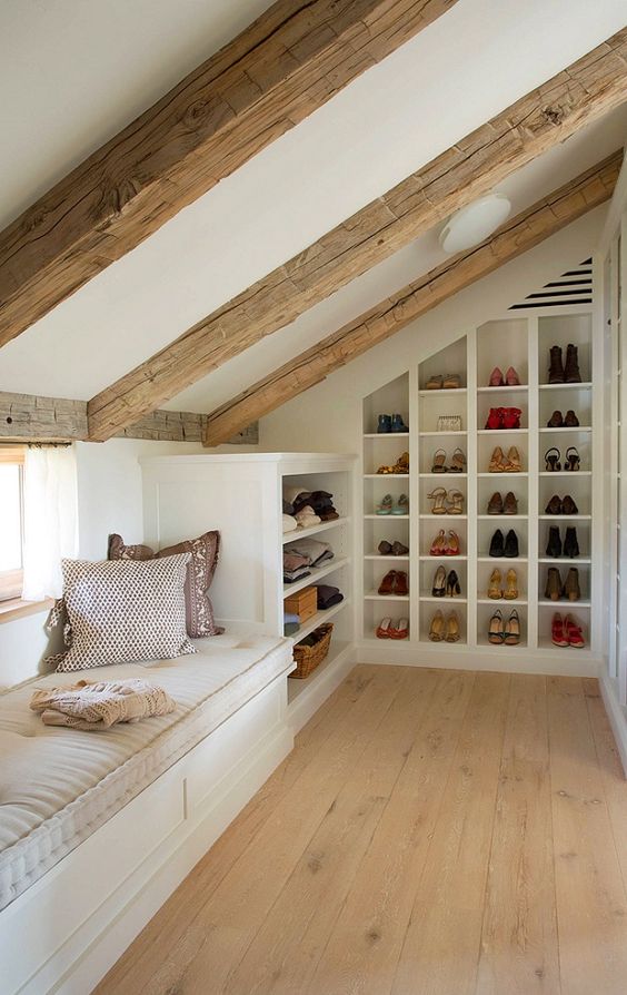 https://www.digsdigs.com/photos/2022/03/a-small-yet-cozy-attic-space-with-a-windowsill-daybed-and-built-in-shoe-shelves-and-clothes-shelves-is-a-very-cool-idea.jpg