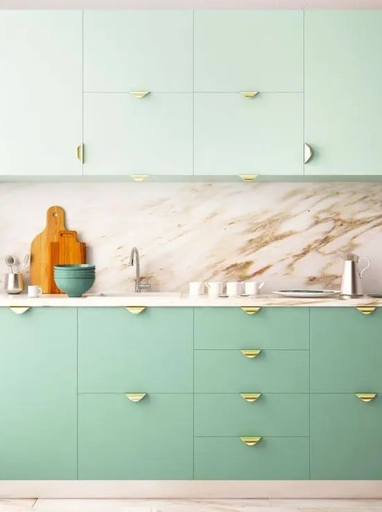 https://www.digsdigs.com/photos/2023/03/a-two-tone-kitchen-with-mint-green-and-brighter-green-cabinets-a-marble-backsplash-and-countertops-gold-pulls-is-amazing.jpg