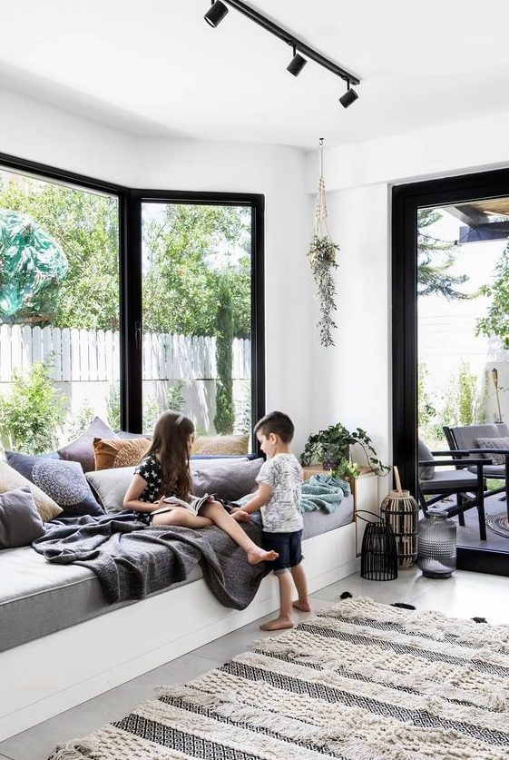 7 Furniture Trends For 2024 And 55 Ideas DigsDigs   53 A Contemporary Space With A Bow Window And A Large And Soft Daybed On The Windowsill Is An Amazing Space To Relax 