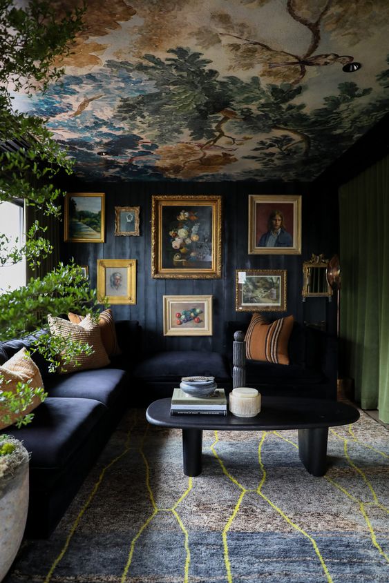 21 A Bright Eclectic Living Room With A Soot Wall A Green Curtain A Bold Ceiling A Printed Rug A Navy Sofa And A Coffee Table 