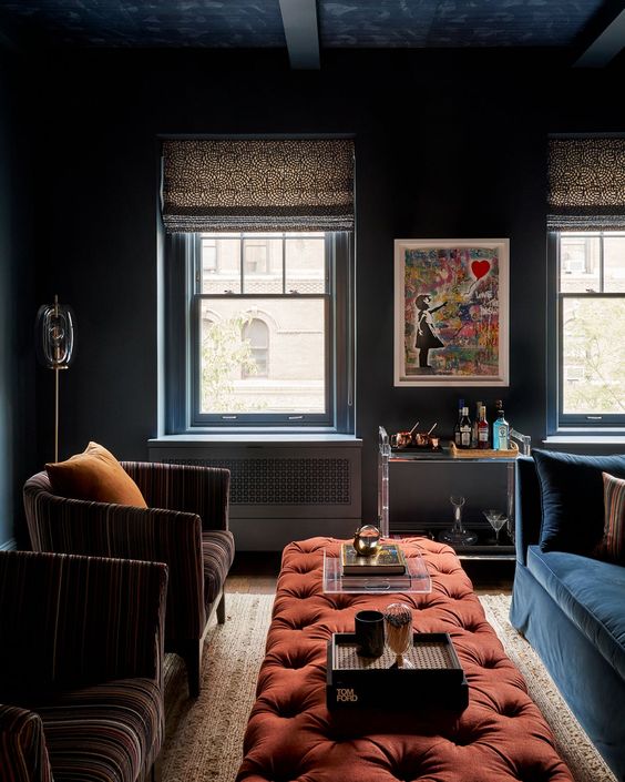 5 Living Room Decor Trends For 2024 And 45 Ideas DigsDigs   31 Moody Living Room With Navy Walls A Navy Sofa A Red Tufted Ottoman Brown Chairs Some Art And A Bar Cart 