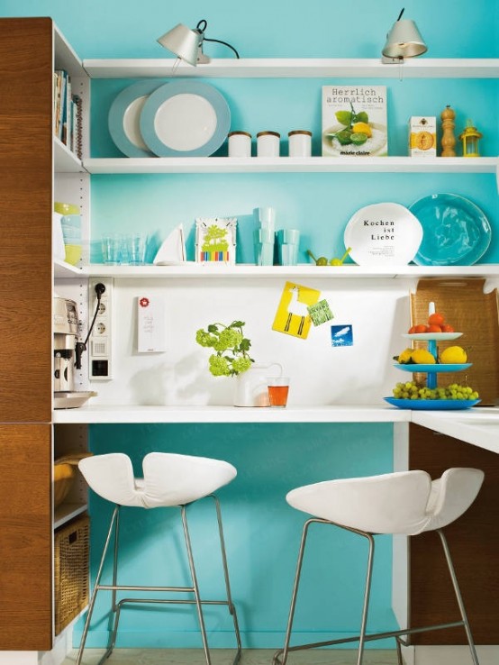 https://www.digsdigs.com/photos/modern-turquoise-kitchen-with-space-saving-solutions-2-554x738.jpg